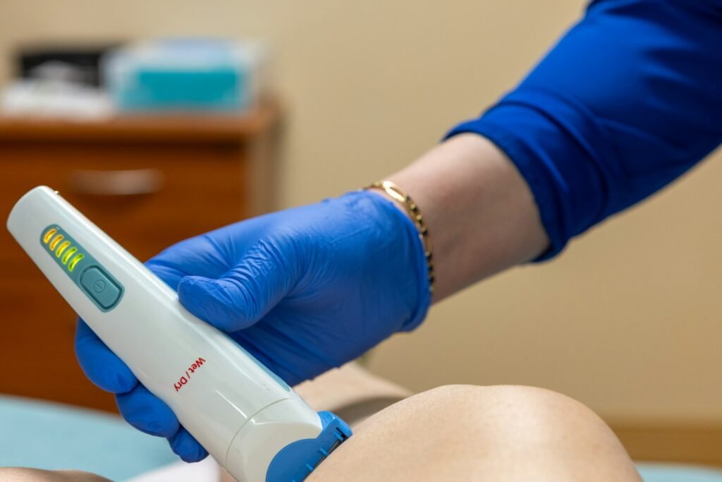 A laser device used on a client’s leg