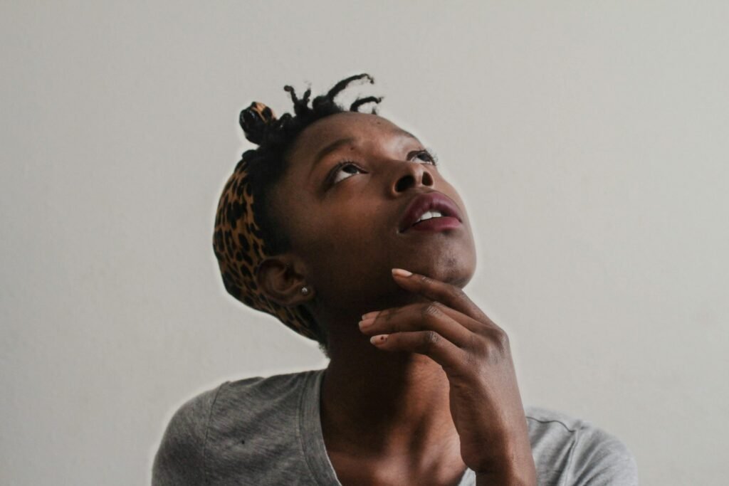 A woman thinking something over