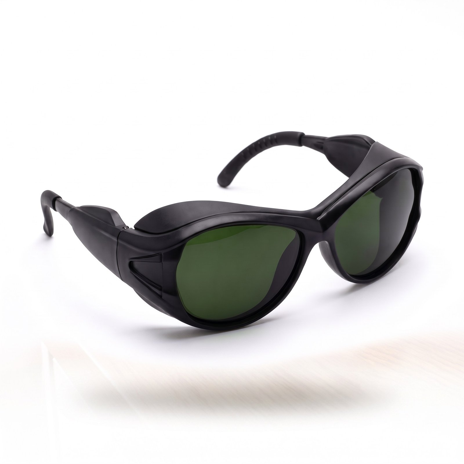 OPT IPL safety glasses with dark green lenses on a white background